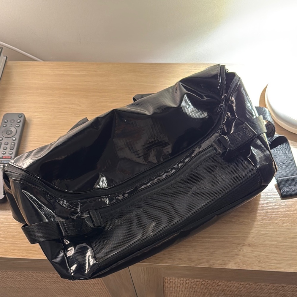 Calpak Terra Black Shiny Crossbody